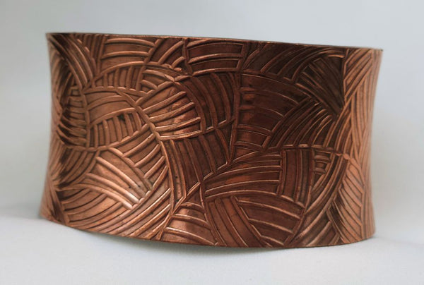 COPPER LINED PATTERN BRACE